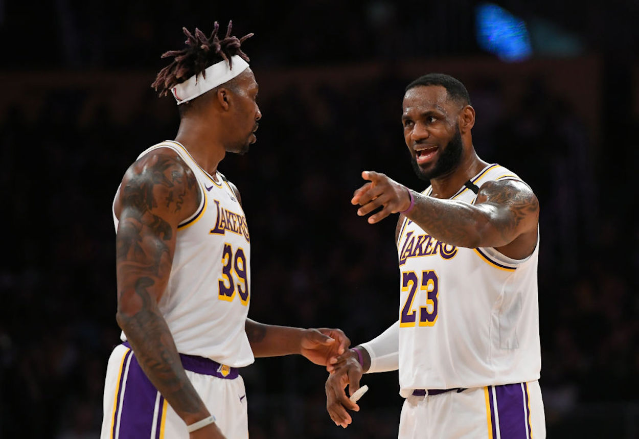 Dwight Howard (L) and LeBron James (R) talk during a Los Angeles Lakers game.