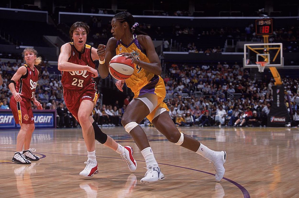 Lisa Leslie drives to the hoop during a WNBA game.