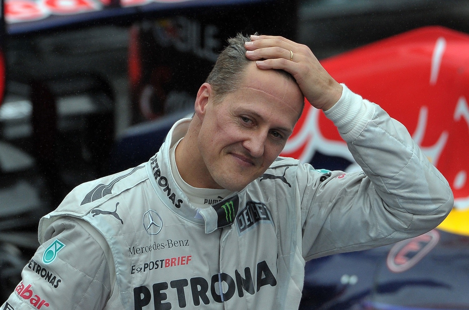 German Formula 1 driver Michael Schumacher gestures at the end of the Brazilian GP on Nov. 25, 2012. | Yasuyoshi Chiba/AFP via Getty Images