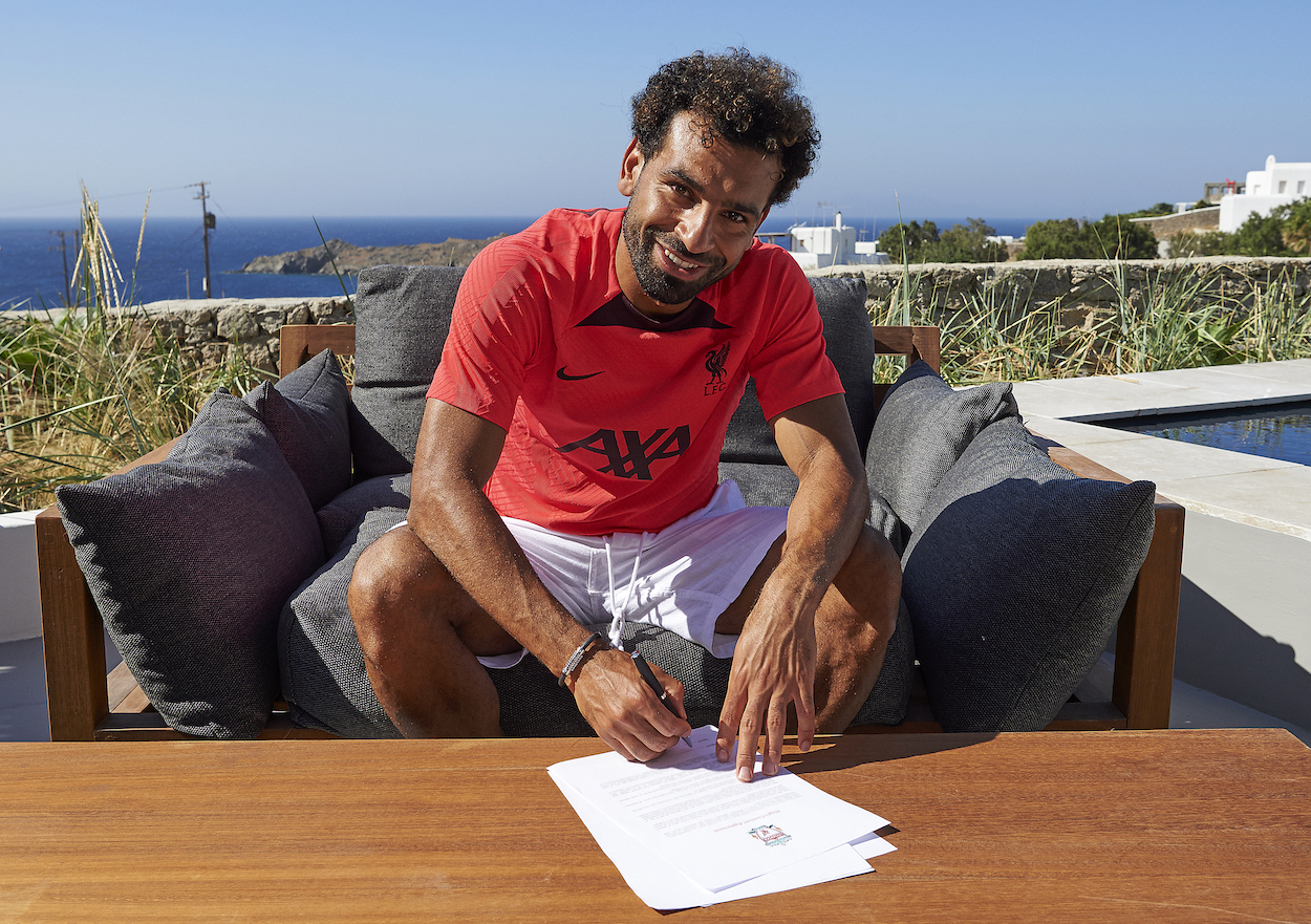 Mohamed Salah of Liverpool signs a contract extension while on holiday in Mykonos, Greece.