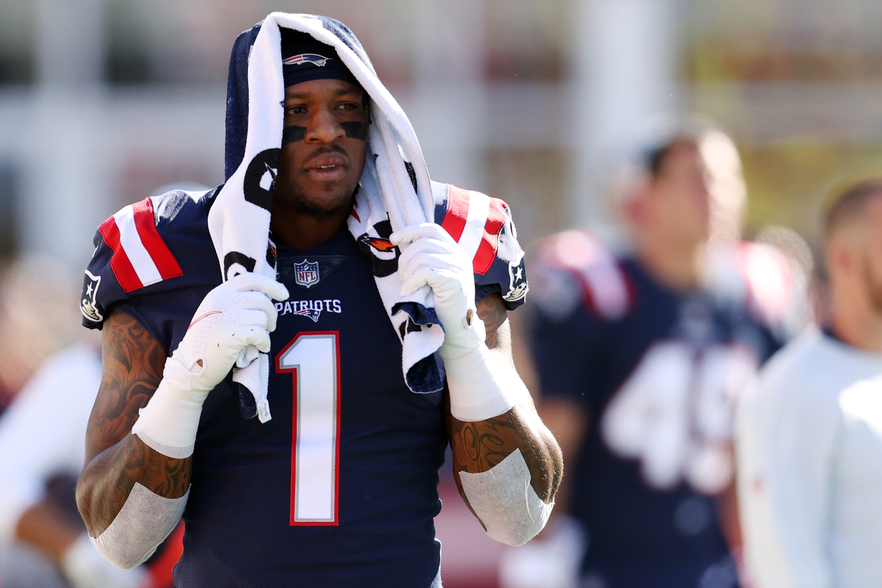 N'Keal Harry of the New England Patriots looks on from the sidelines.