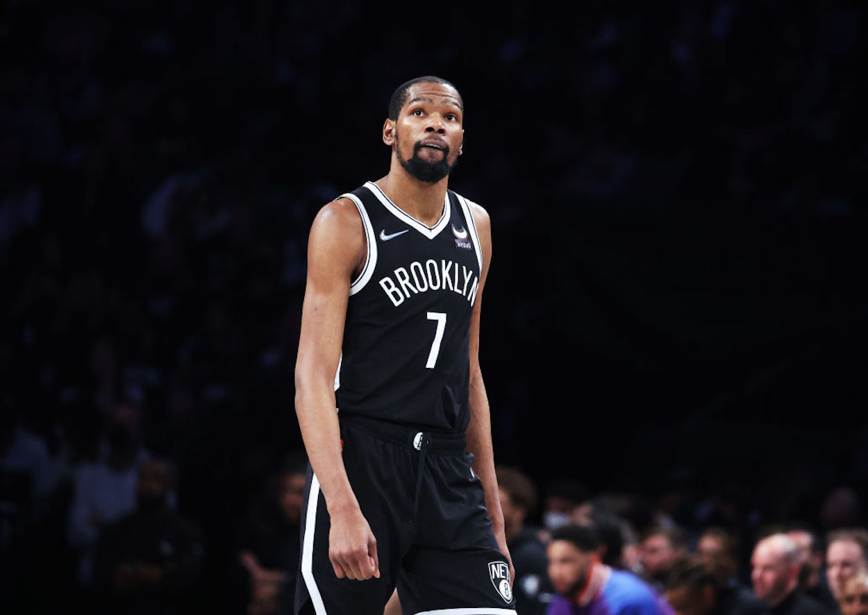 Brooklyn Nets guard Kevin Durant walks up the court.