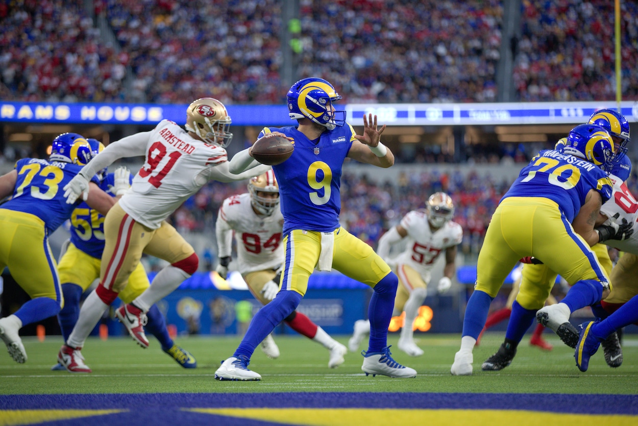 Matthew Stafford passes against the 49ers.