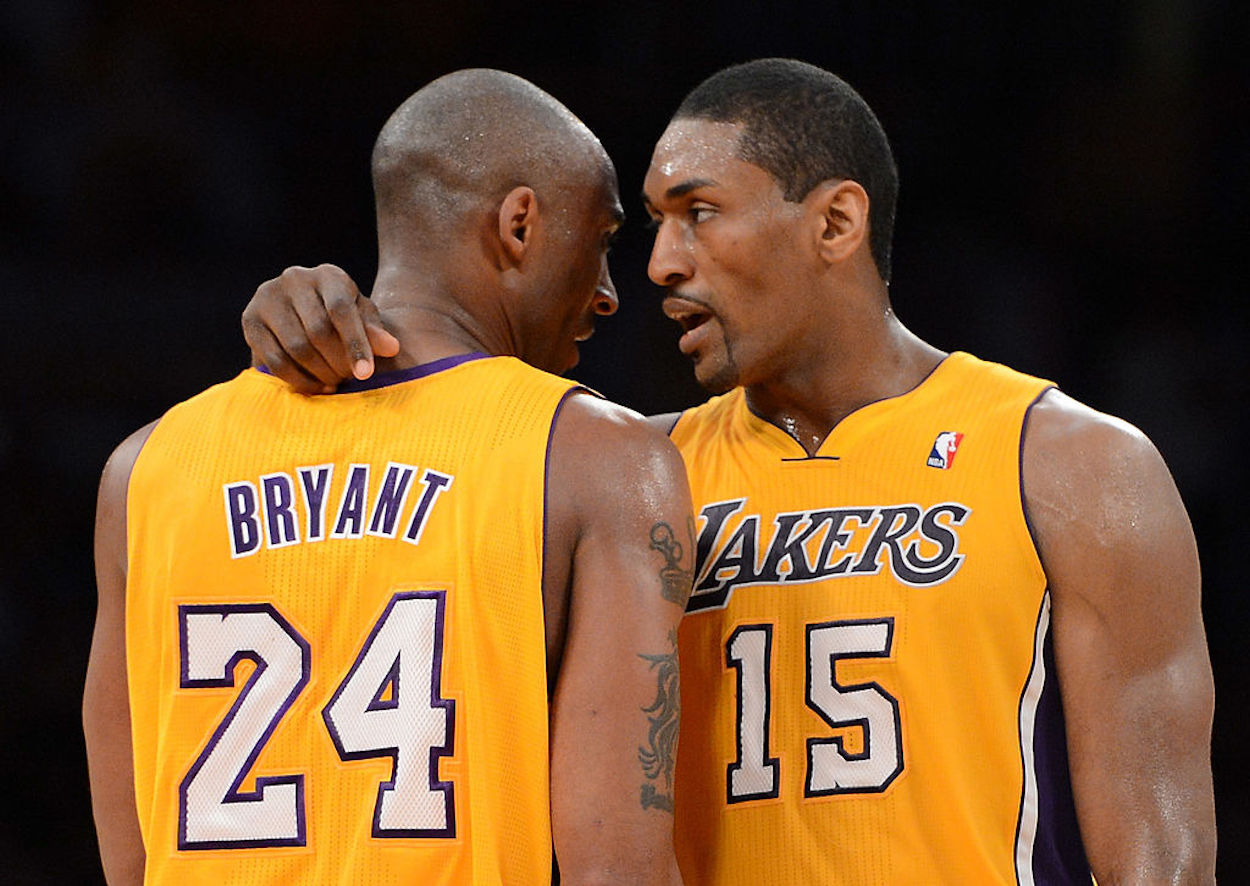 Kobe Bryant (L) and Ron Artest (R) speak as members of the Los Angeles Lakers.