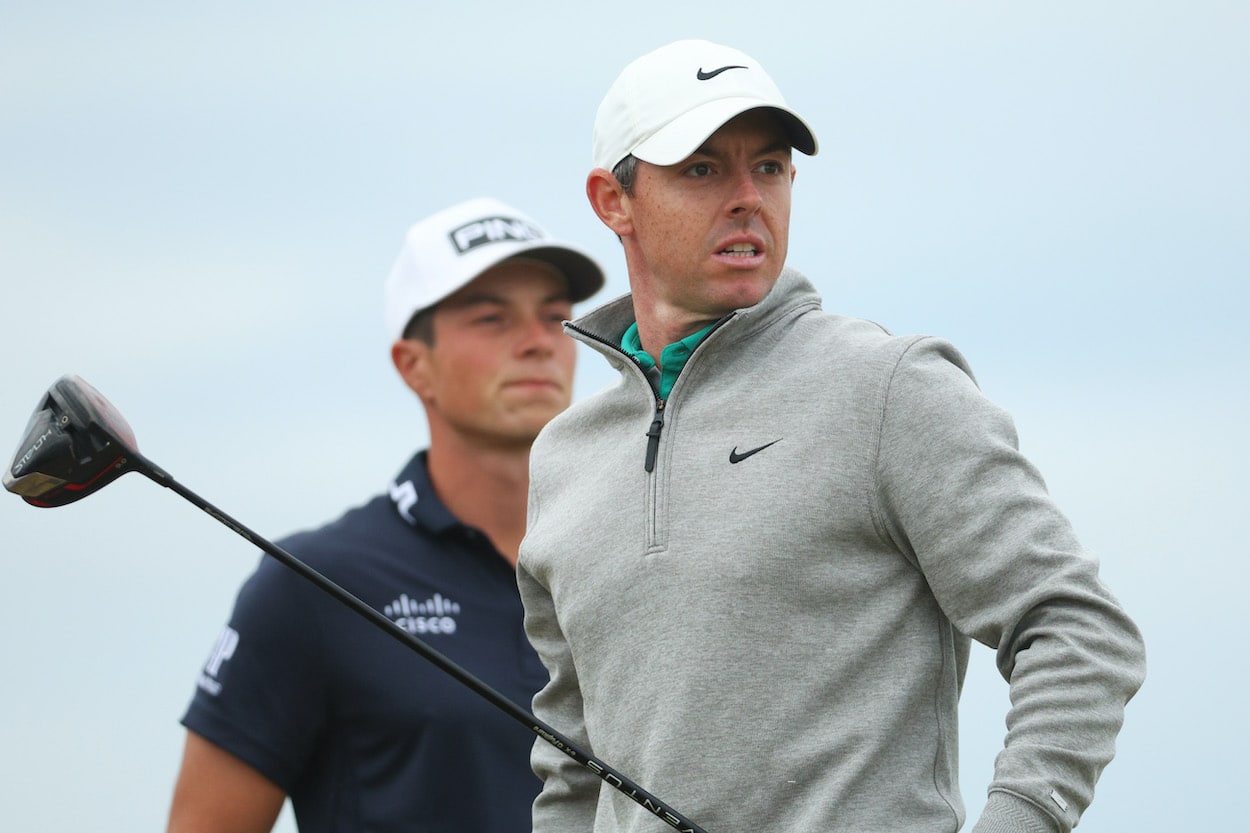 Rory McIlroy and Viktor Hovland look on during the 2022 Open.