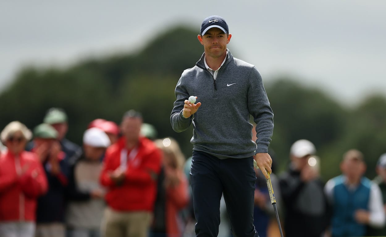 Rory McIlroy waves to the crowd.