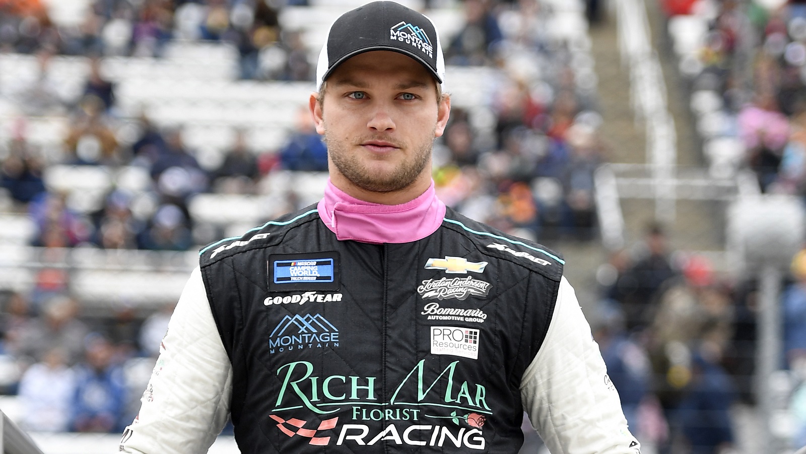 Sage Karam walks on stage during ceremonies prior to the NASCAR Camping World Truck Series United Rentals 200 at Martinsville Speedway on Oct. 30, 2021. | Logan Riely/Getty Images