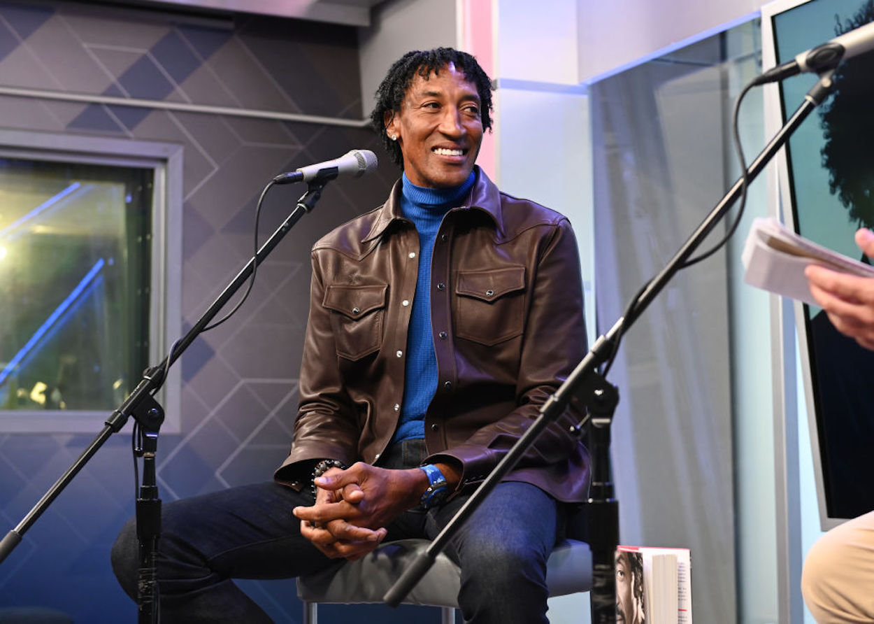 NBA legend Scottie Pippen sits in front of a microphone.