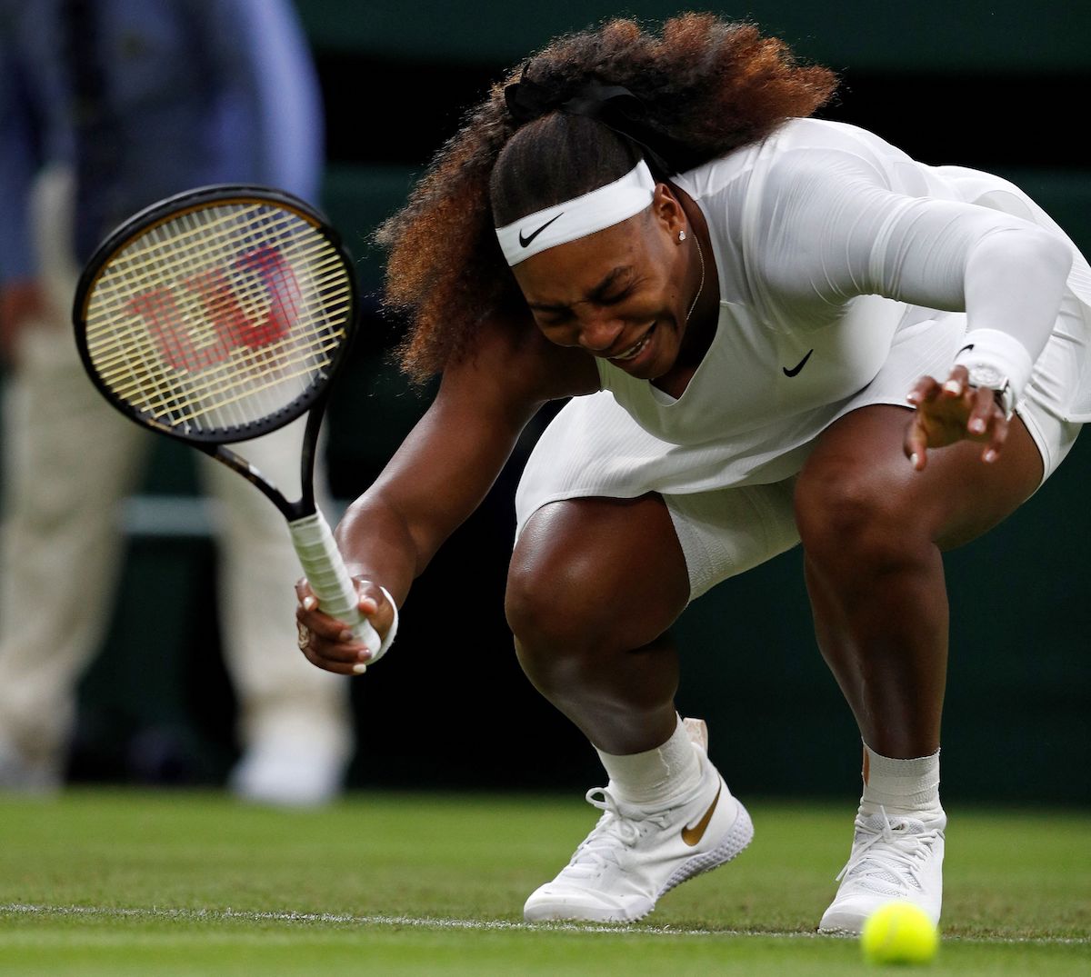 Tennis player Serena Williams reacts as she gets injured before withdrawing from the 2021 Wimbledon Championships