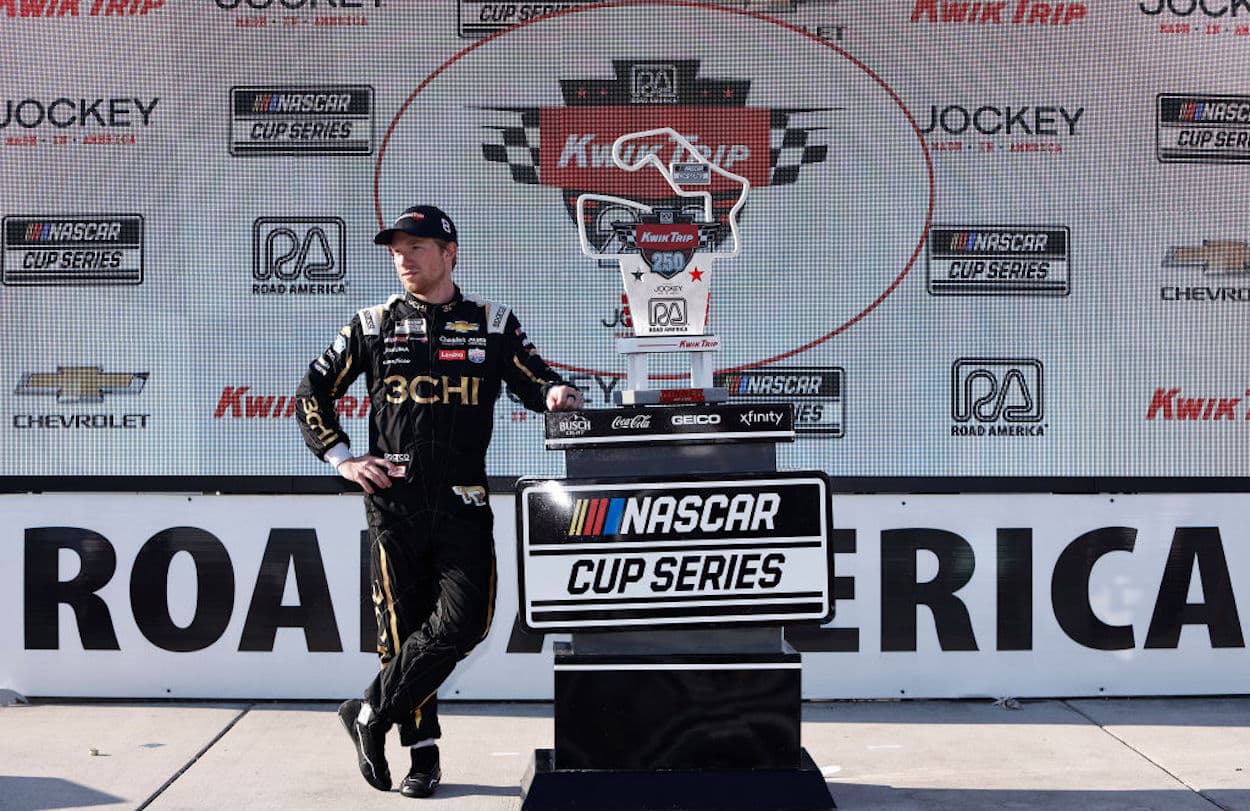 Tyler Reddick in Victory Lane at the NASCAR Cup Series Kwik Trip 250.