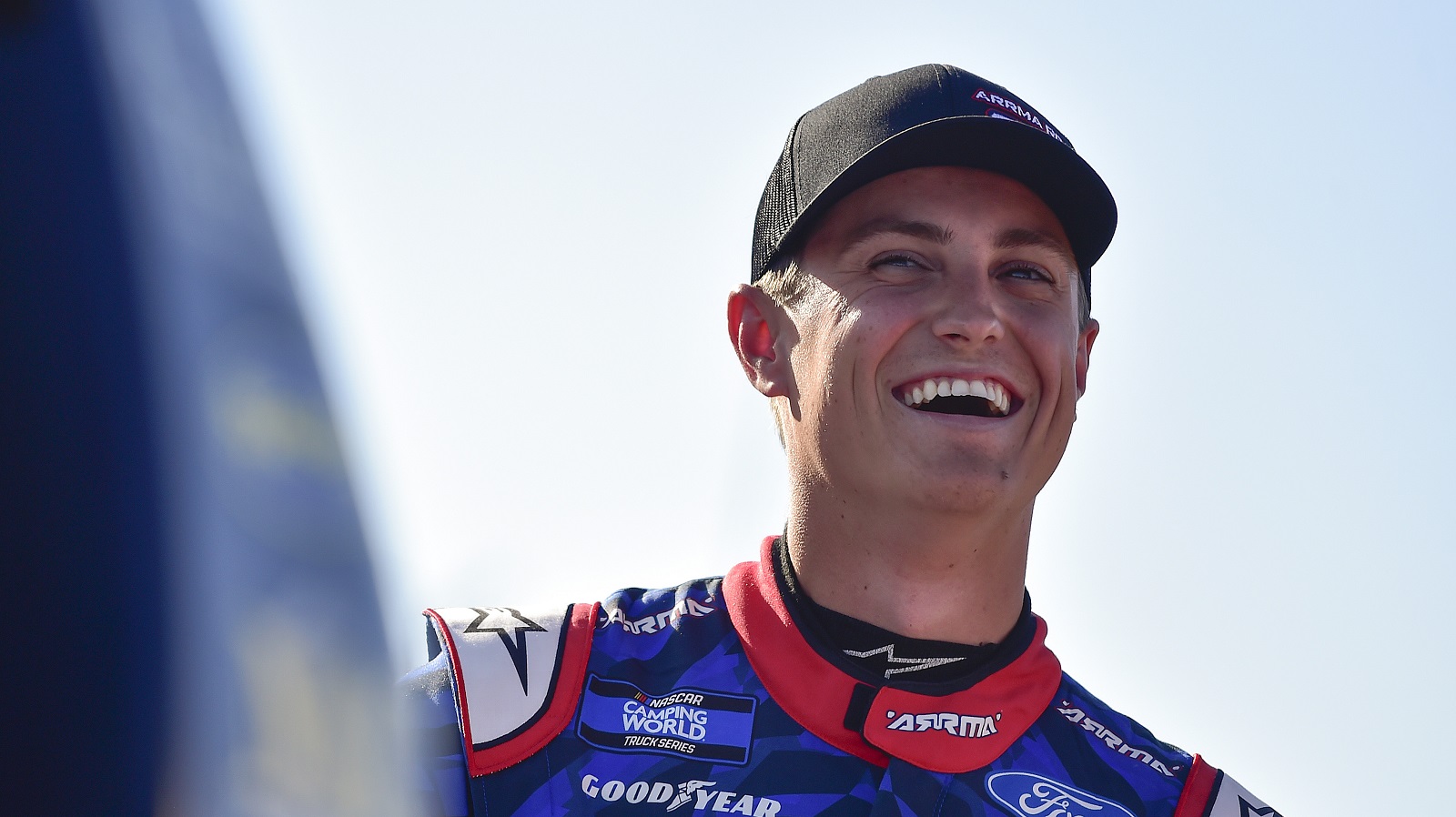 Zane Smith shares a laugh on the grid during qualifying for the NASCAR Camping World Truck Series Toyota 200 at WWT Raceway on June 3, 2022, in Madison, Illinois. | Jeff Curry/Getty Images