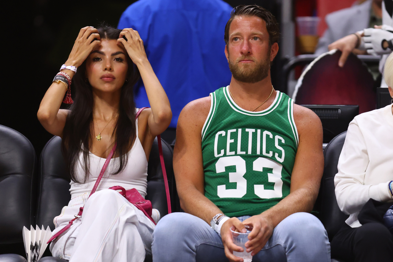 Barstool Sports founder Dave Portnoy and his girlfriend Silvana Mojica look on in Game 2 of the 2022 NBA Playoffs Eastern Conference Finals between the Miami Heat and the Boston Celtics.