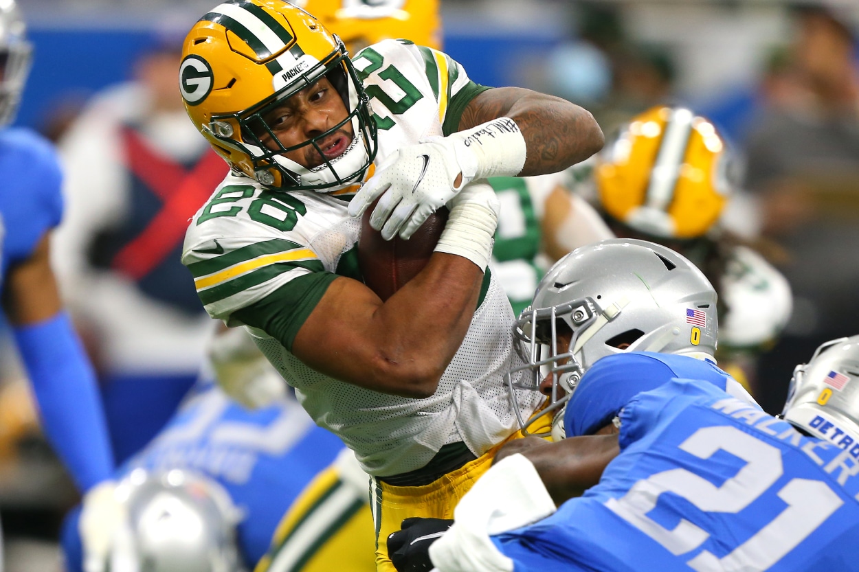 Green Bay Packers running back AJ Dillon runs the ball.