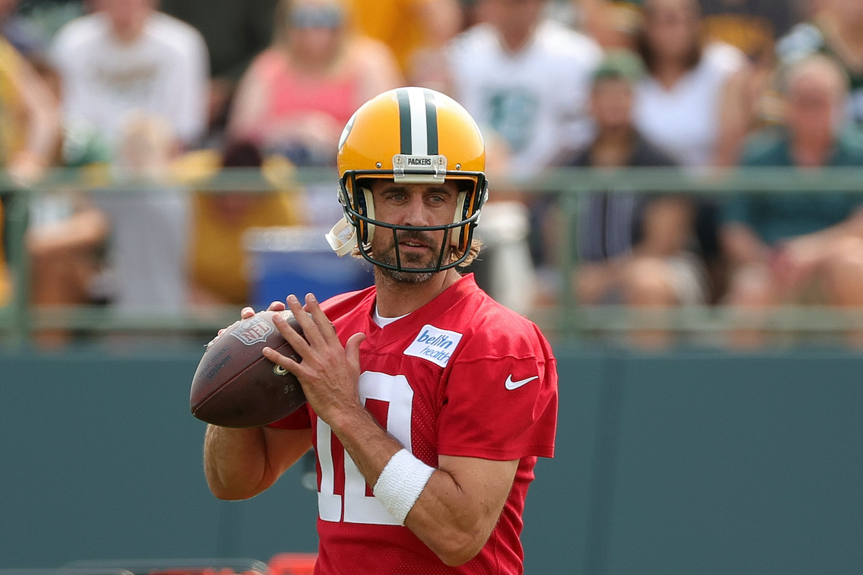Aaron Rodgers looks to pass during training camp.