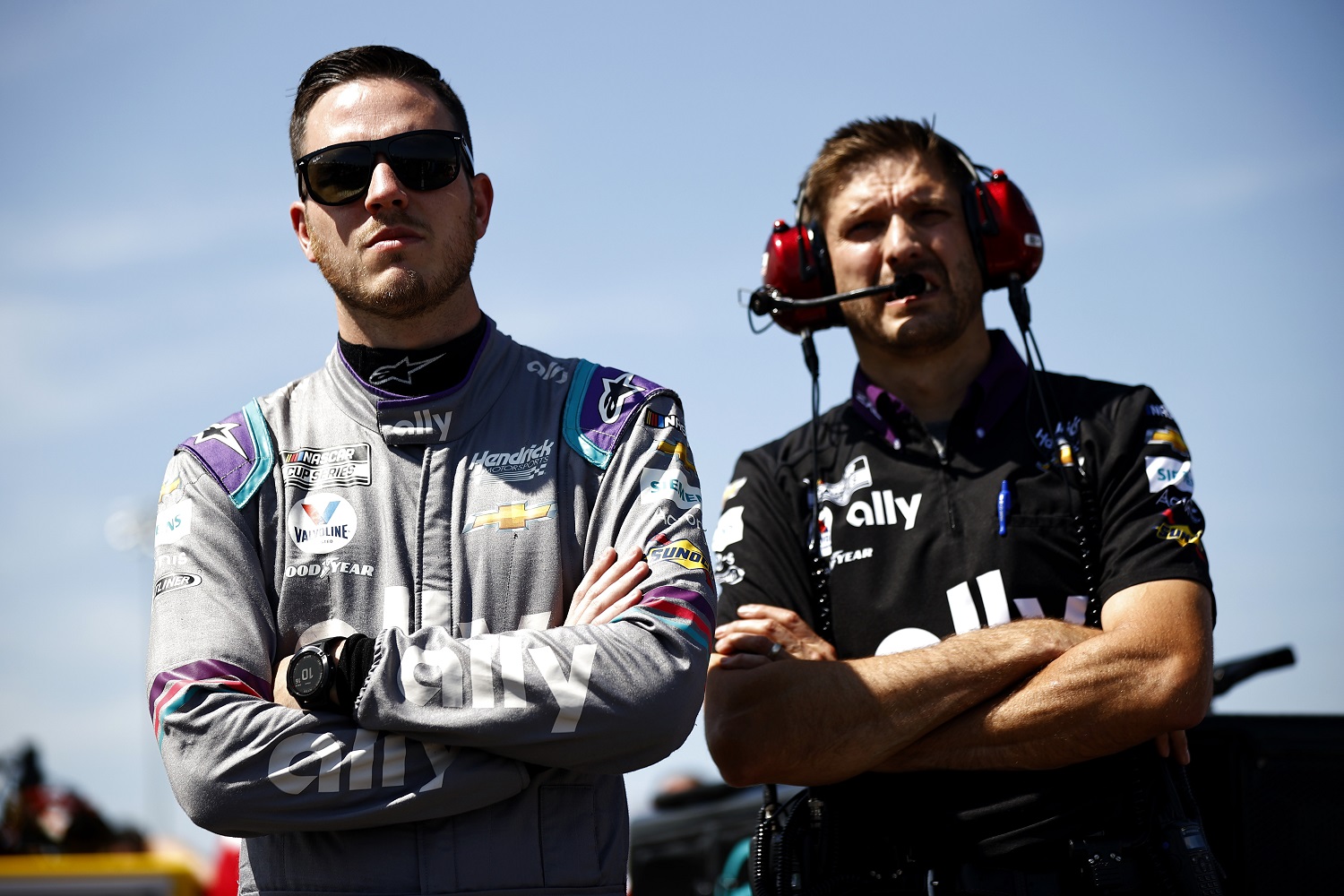 Alex Bowman, driver of the No. 48 Chevrolet, and crew chief Greg Ives look on during qualifying for the NASCAR Cup Series Ally 400 at Nashville Superspeedway on June 20, 2021.