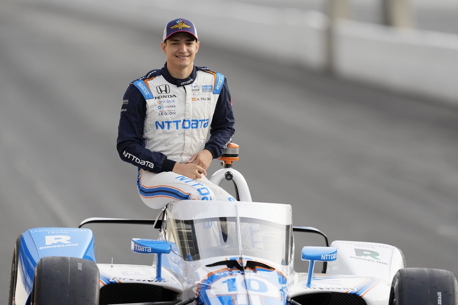 Alex Palou poses for the front-row photo for the 106th running of the Indianapolis 500 at the Indianapolis Motor Speedway.