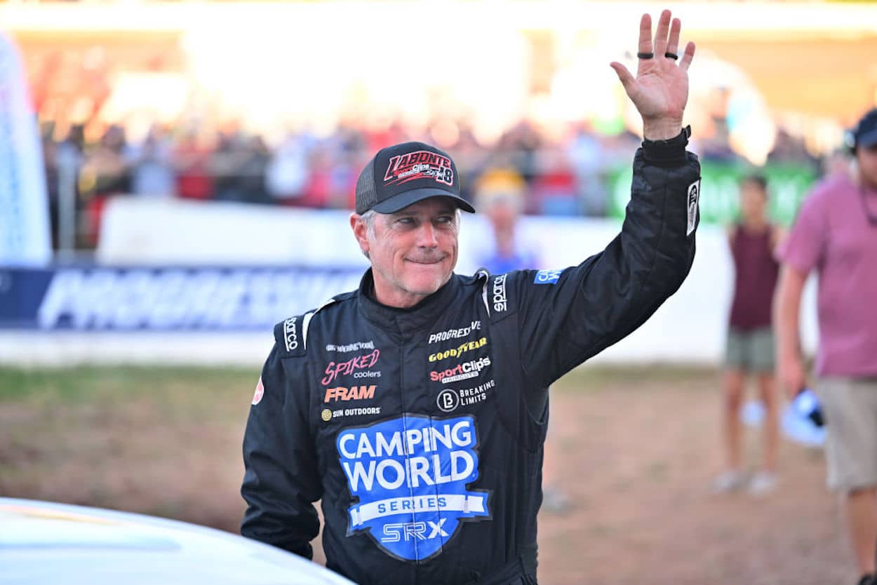 NASCAR legend Bobby Labonte waves to the crowd.