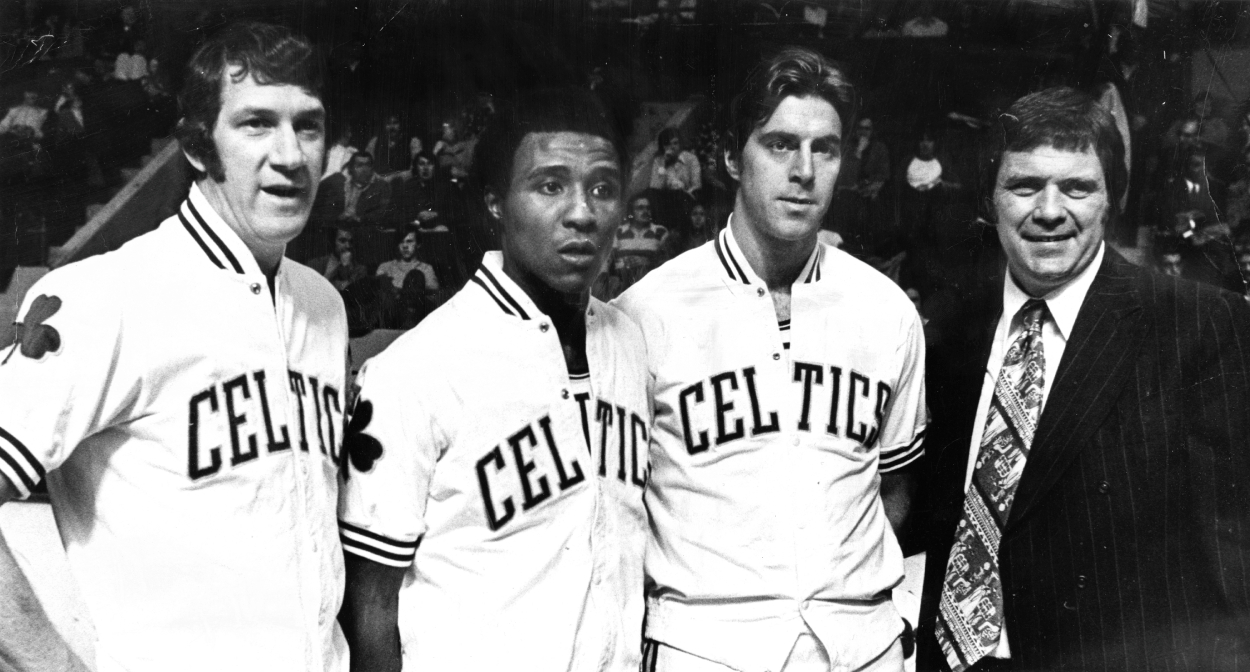 From left, Boston Celtics stars John Havlicek, JoJo White and Dave Cowens stand with head coach Tom Heinsohn.