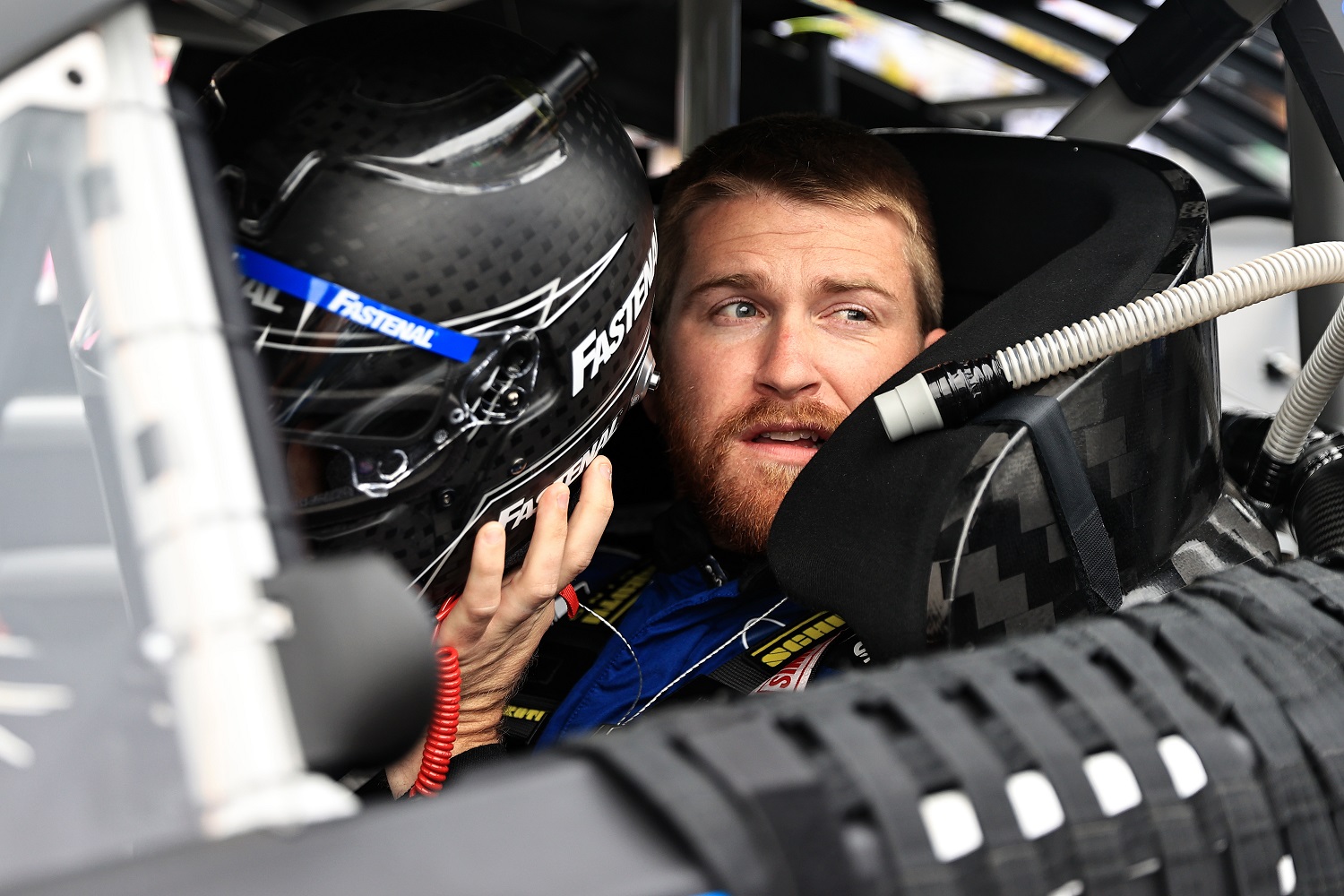 Chris Buescher sits in his car during practice for the NASCAR Cup Series All-Star Race at Texas Motor Speedway on May 21, 2022.