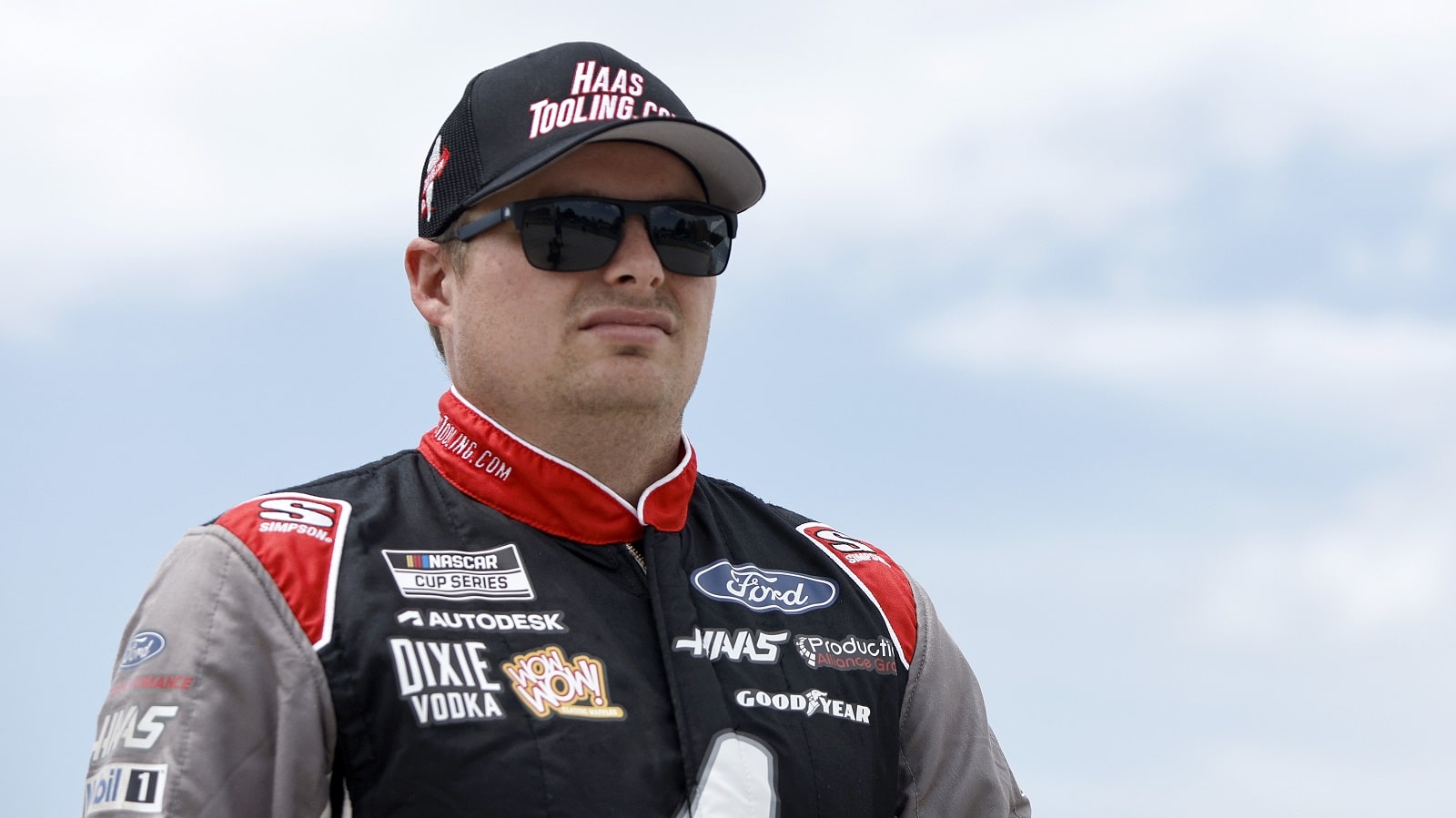 Cole Custer, driver of the No. 41 Ford, walks the grid prior to the NASCAR Cup Series Kwik Trip 250 at Road America on July 3, 2022 in Elkhart Lake, Wisconsin. | Sean Gardner/Getty Images