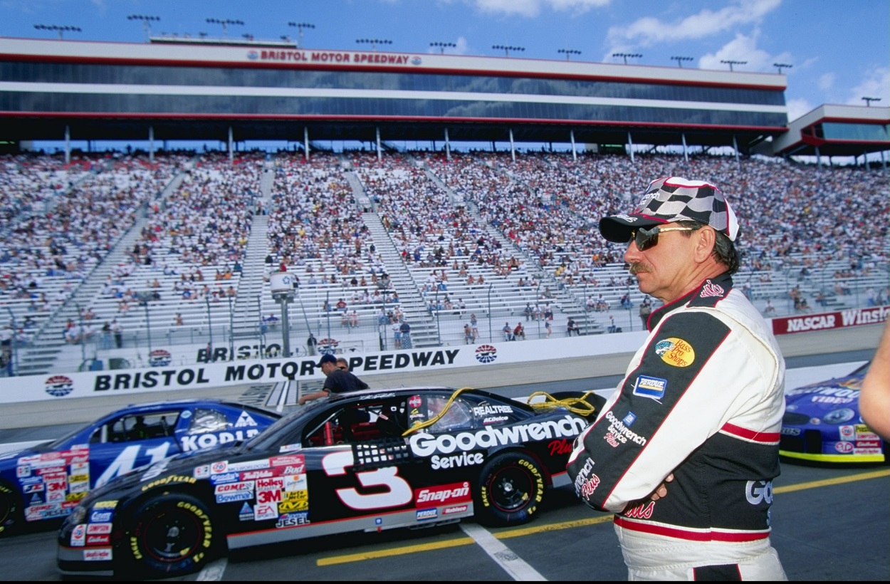 Dale Earnhardt Sr. next to his No. 3 car in 1999 at Bristol Motor Speedway