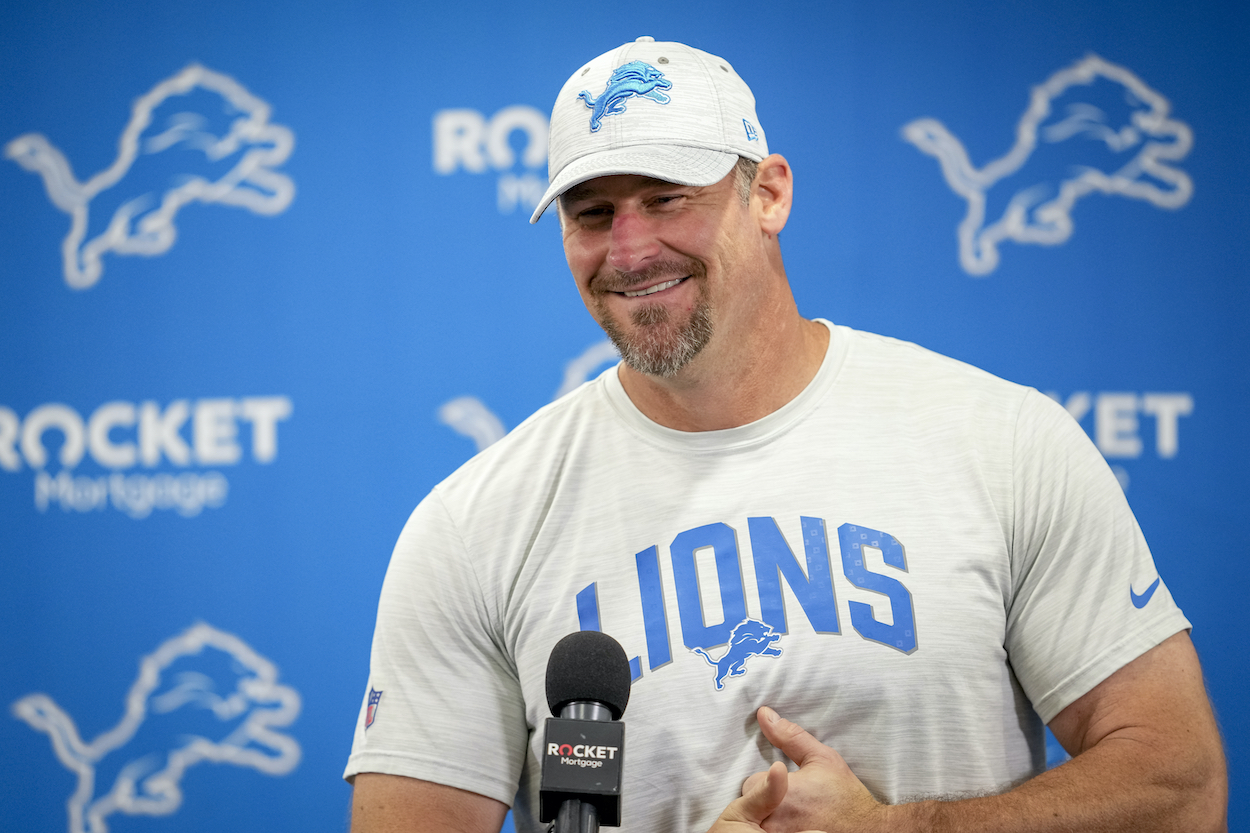 Dan Campbell smiles during a press conference.