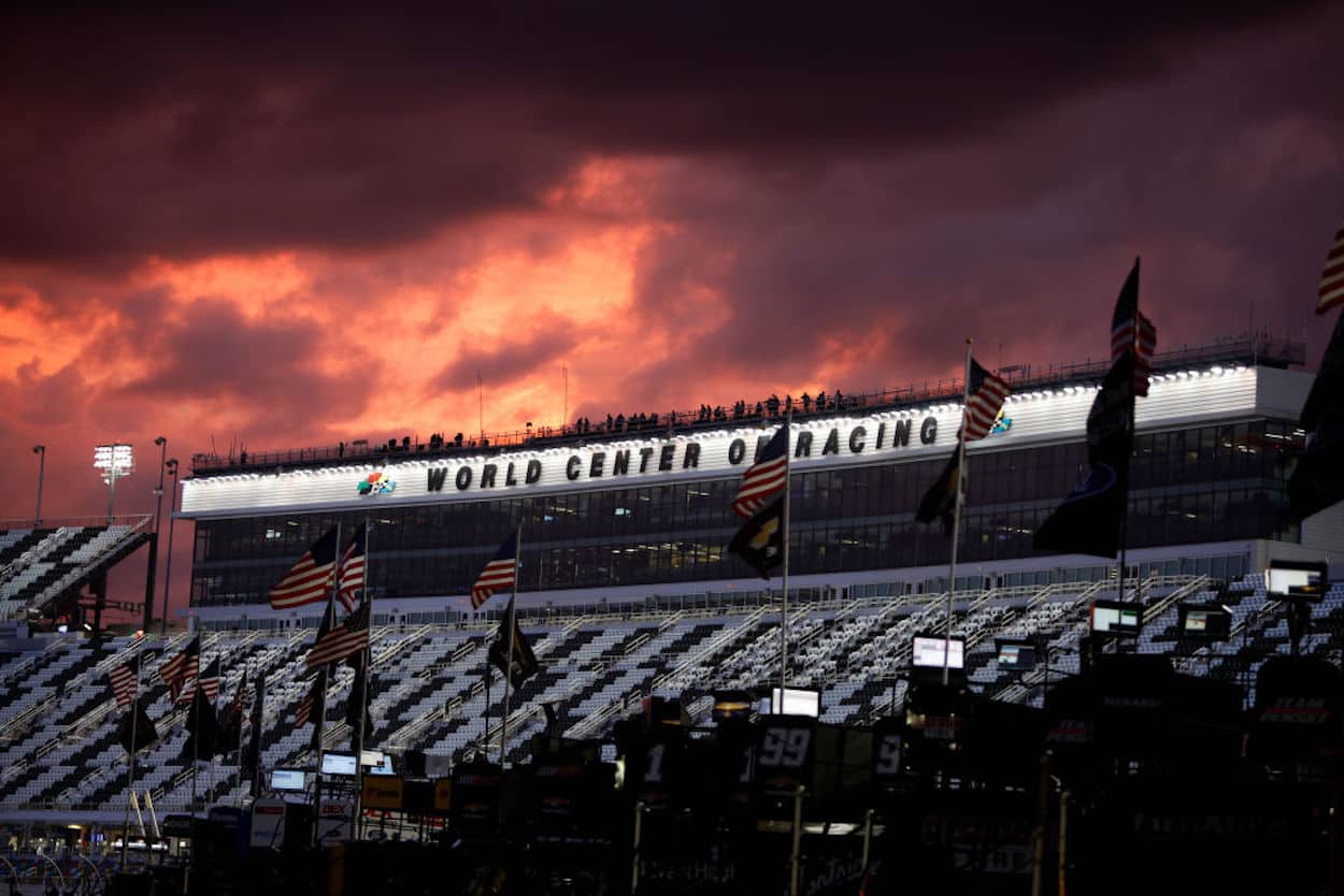 The Daytona International Speedway grandstand at sunset.