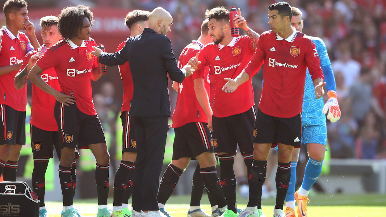 Manchester United manager Erik ten Hag chats with Cristiano Ronaldo of Manchester United during the Pre-Season Friendly match between Manchester United and Rayo Vallecano at Old Trafford on July 31, 2022.