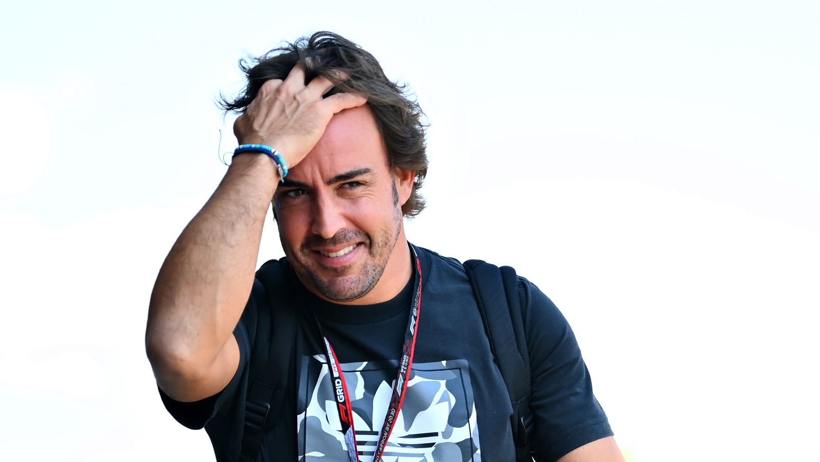 Fernando Alonso of Spain and Alpine Formula 1 walks in the Paddock during previews ahead of the Grand Prix of Hungary at Hungaroring on July 28, 2022.