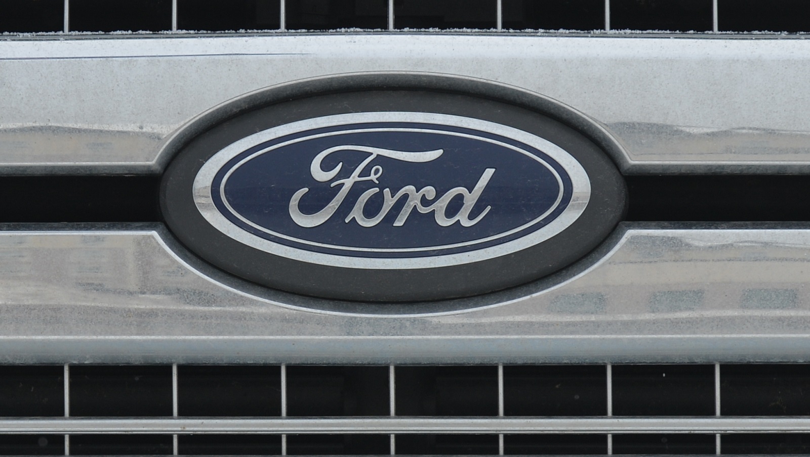 Ford logo seen on Ford vehicle outside a dealership in in Edmonton, Alberta, Canada.