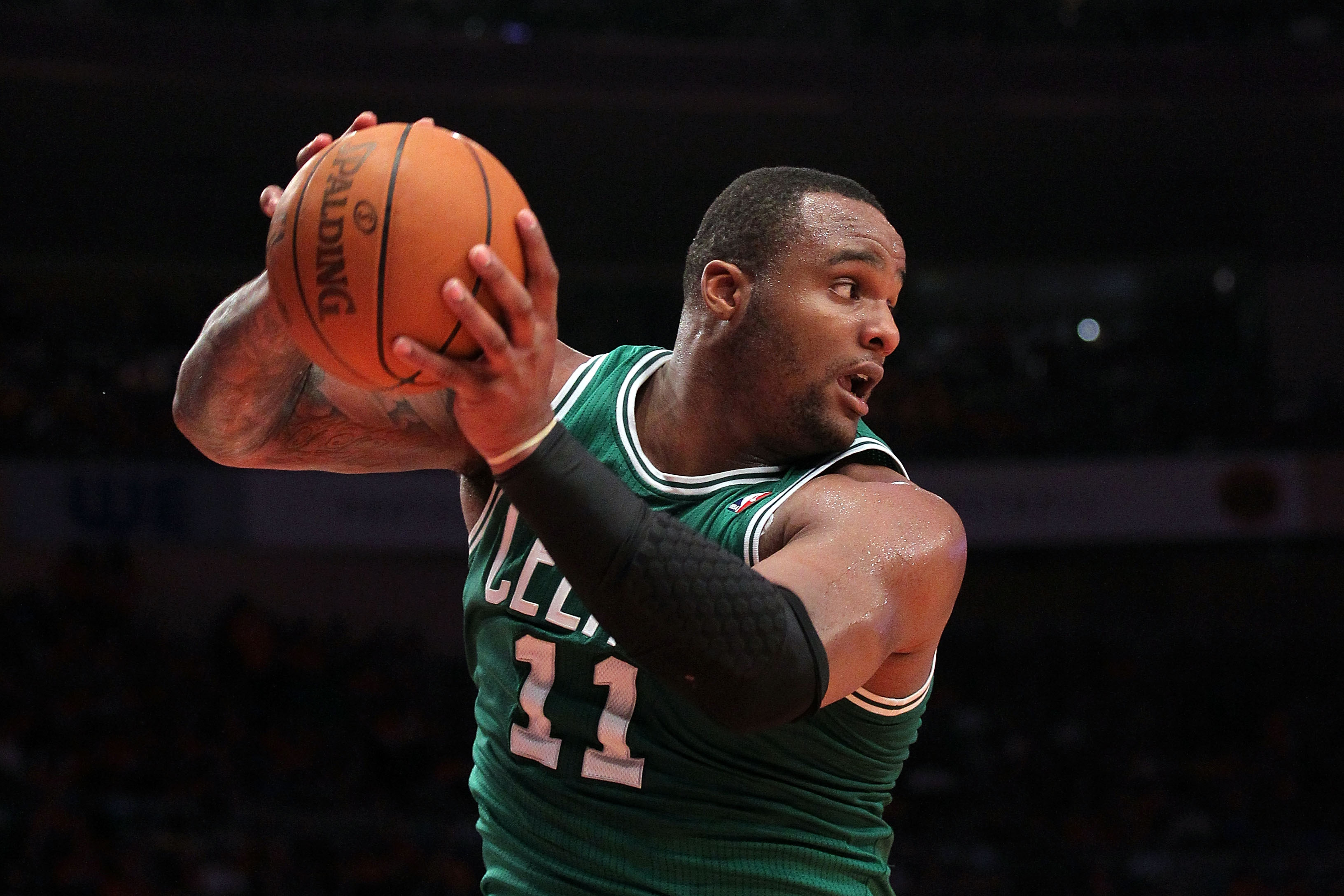 Glen Davis of the Boston Celtics controls a rebound against the New York Knicks.