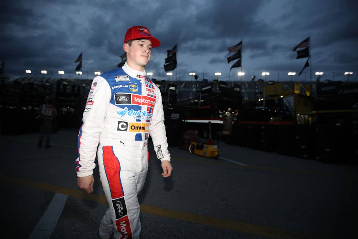 Harrison Burton walks the garage ahead of the Daytona 500.