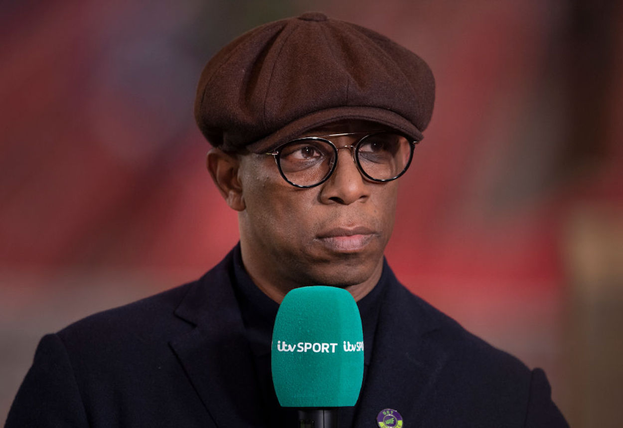 Arsenal legend turned pundit Ian Wright at the microphone.