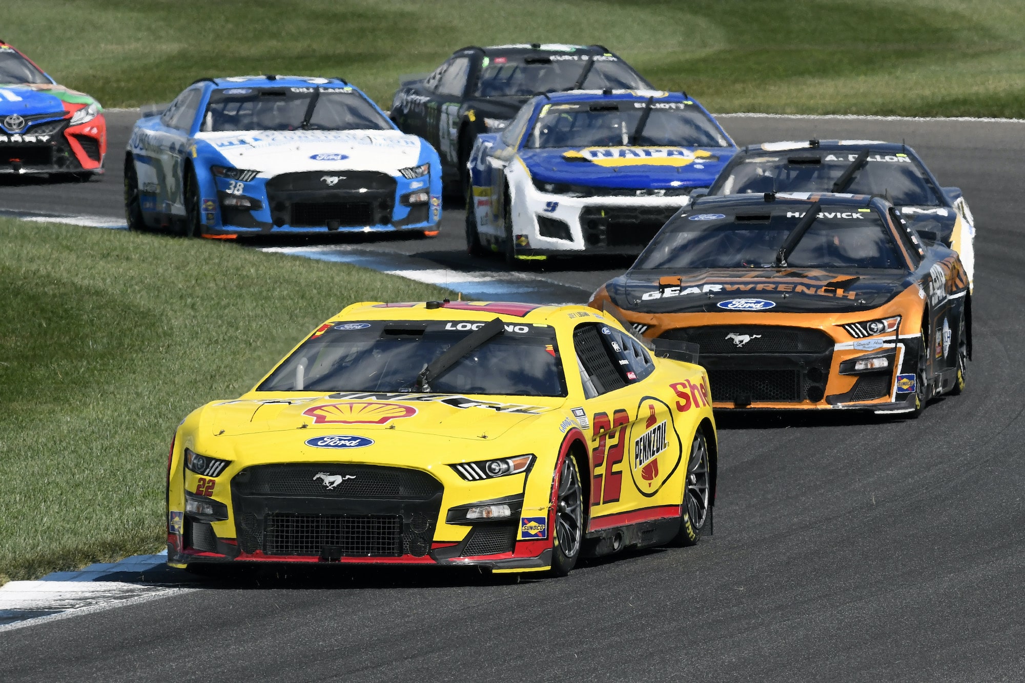 Joey Logano races at Indy