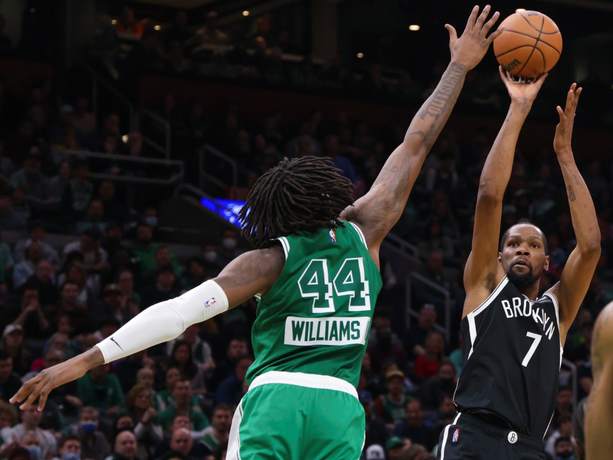 Brooklyn Nets forward Kevin Durant scores over Boston Celtics center Robert Williams III.