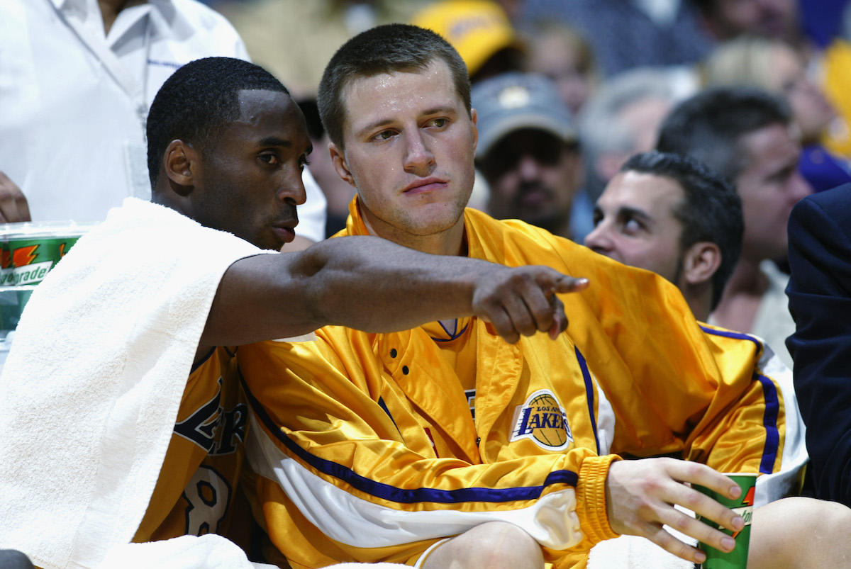Kobe Bryant talks to Stanislav Medvedenko of the Los Angeles Lakers during the 2002 NBA season opener