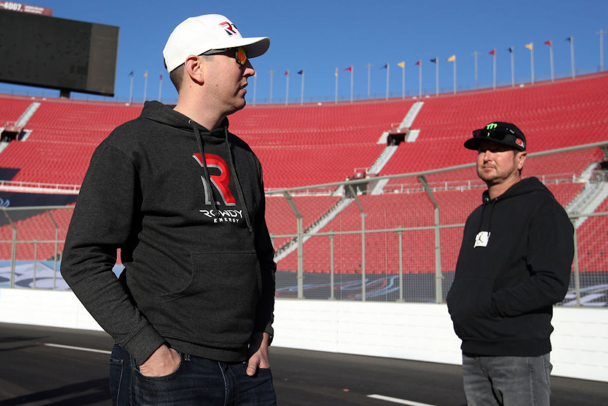 Kurt Busch (R) and Kyle Busch (L) on the track ahead of a 2022 NASCAR Cup Series race.
