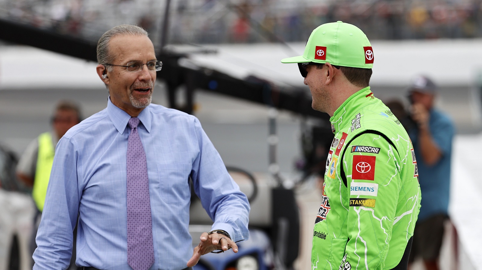 Kyle Petty talks to Kyle Busch before the Foxwoods Resort Casino 301 on July 18, 2021, at New Hampshire Motor Speedway in Loudon, New Hampshire.