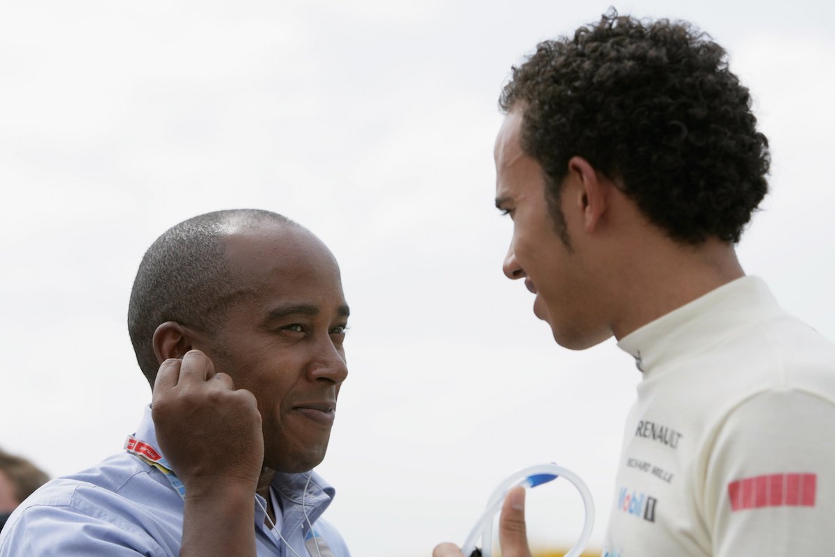 In 2006, Lewis Hamilton talks to his dad Anthony Hamilton prior to the GP2 race in 2006
