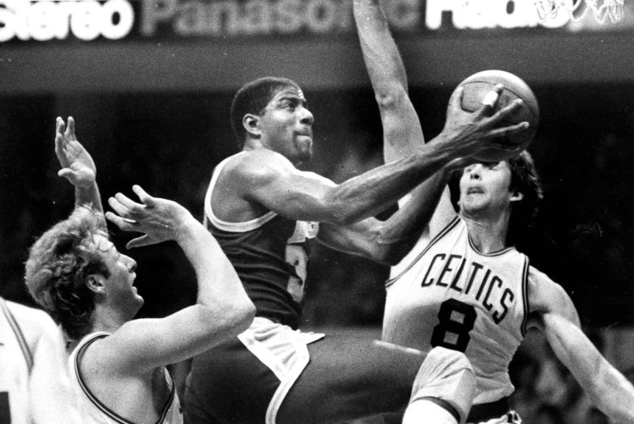 Magic Johnson drives to the rim during his time with the Los Angeles Lakers.