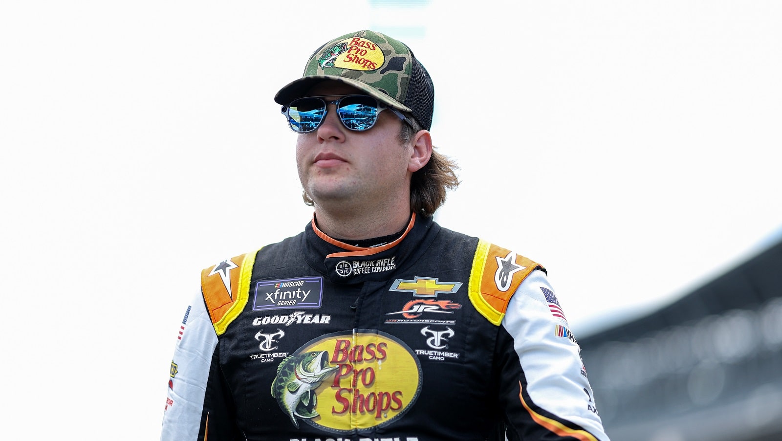 Noah Gragson walks the grid during practice for the NASCAR Xfinity Series Pennzoil 150 at the Brickyard at Indianapolis Motor Speedway on July 29, 2022. | James Gilbert/Getty Images