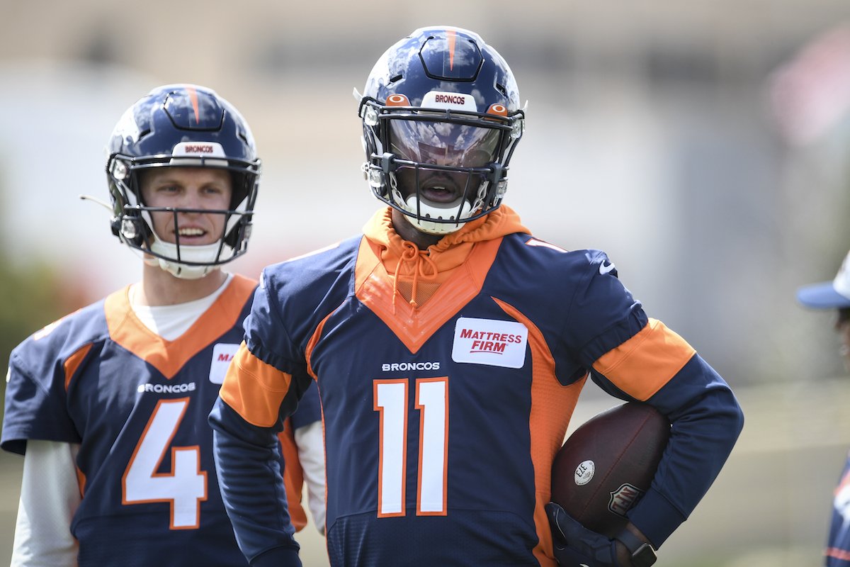 Josh Johnson of the Denver Broncos work out during mini camp in 2022