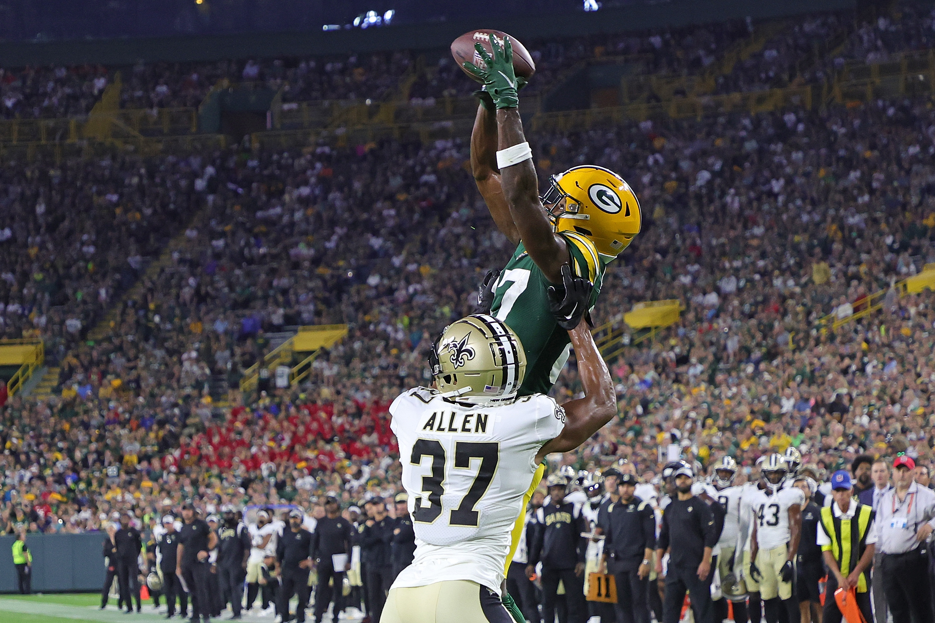 Romeo Doubs of the Green Bay Packers catches a pass for a touchdown.