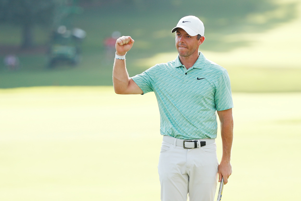 Rory McIlroy celebrates after winning the 2022 Tour Championship.