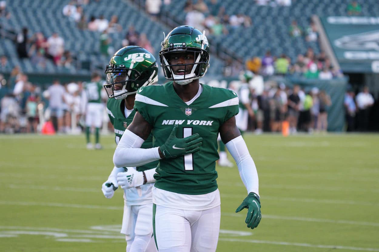 Sauce Gardner looks on before a preseason game.