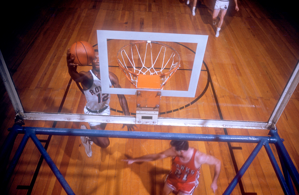Si Green of the Cincinnati Royals goes for the layup.