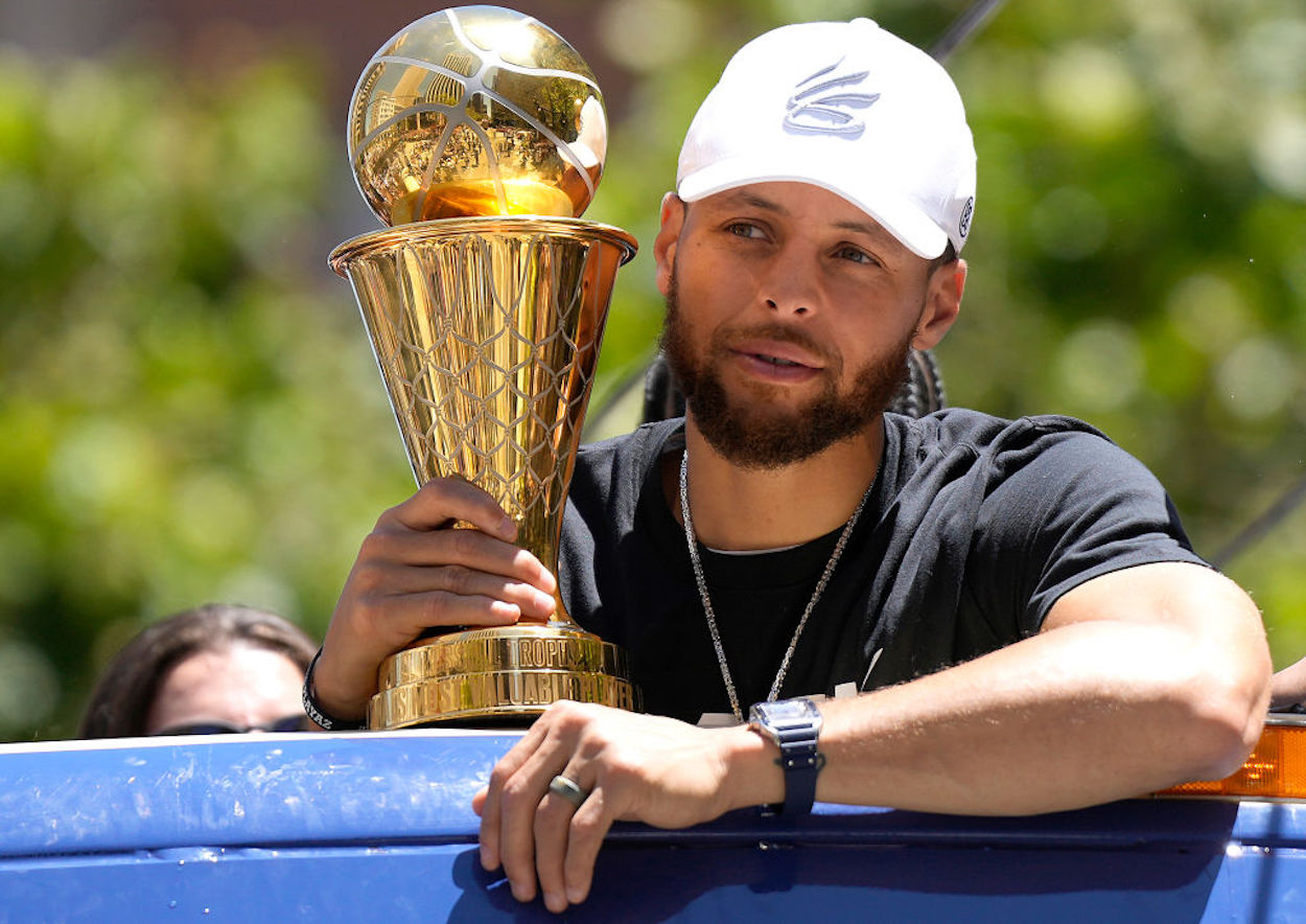 Stephen Curry holds his MVP award during the Golden State Warr