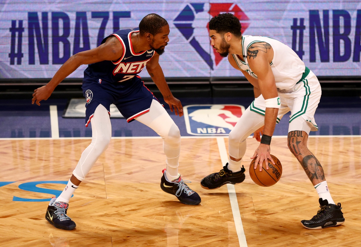 Kevin Durant of the Brooklyn Nets and Jayson Tatum of the Boston Celtics square off.