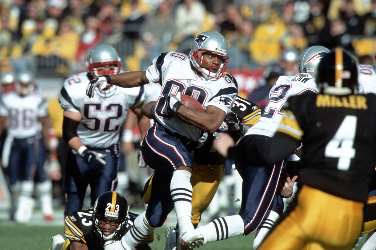Troy Brown of the New England Patriots returns a punt 80 yards for a touchdown.
