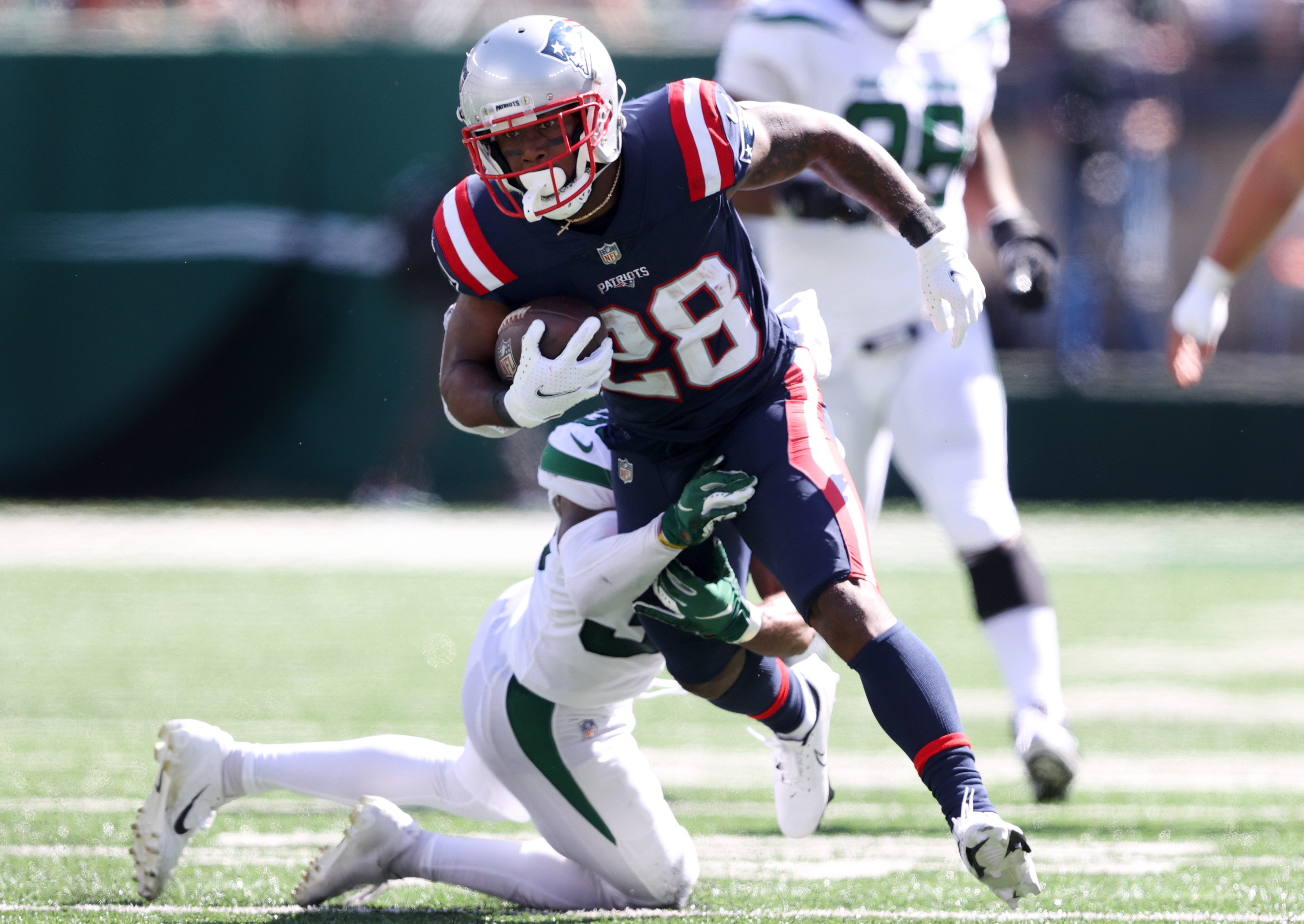 Running back James White of the New England Patriots runs the ball.